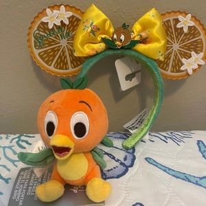 Disney parks orange bird shoulder friend and orange bird ears.